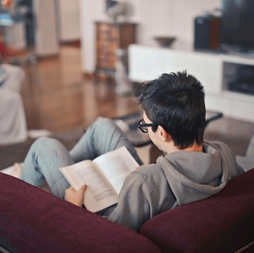 QRTP Page teen sitting in residential setting 1